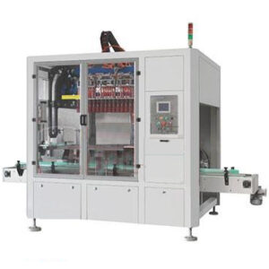 Machine for packing packs in cartons
